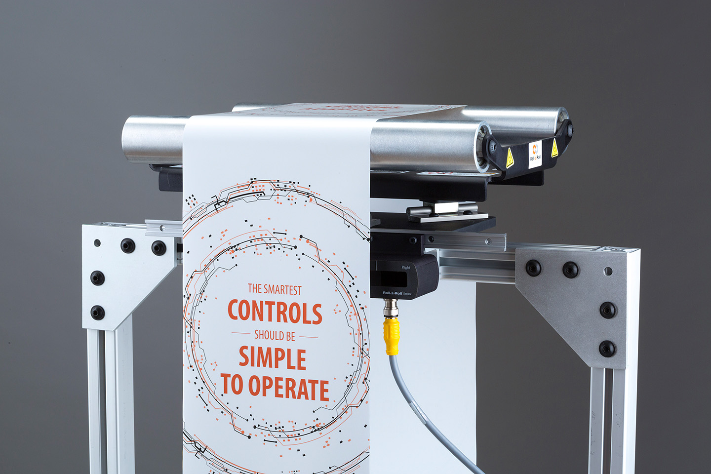 Web guide with an edge sensor