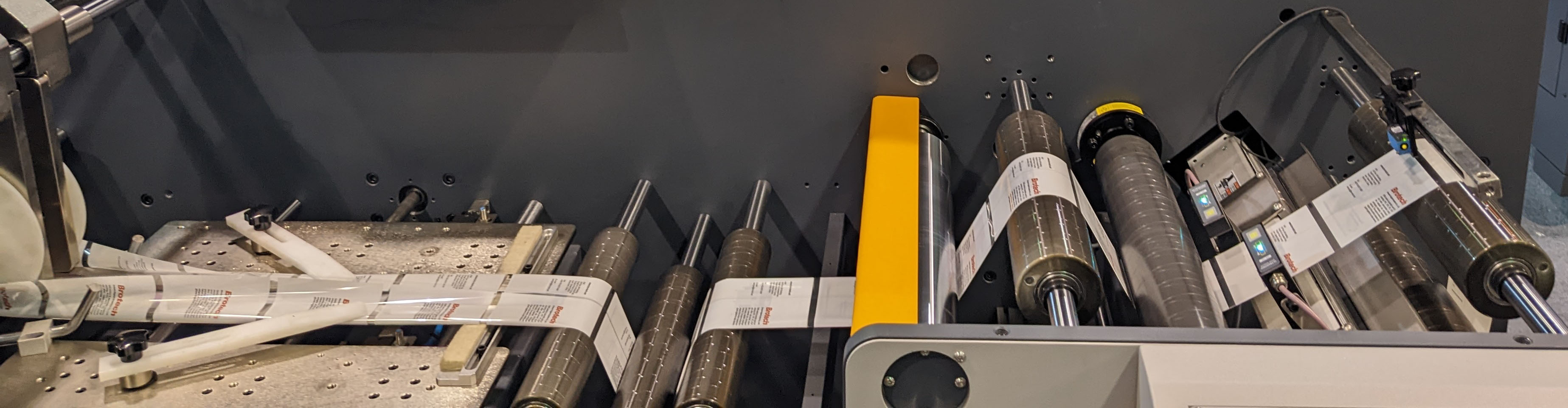 Shrink sleeve web width measurement application
