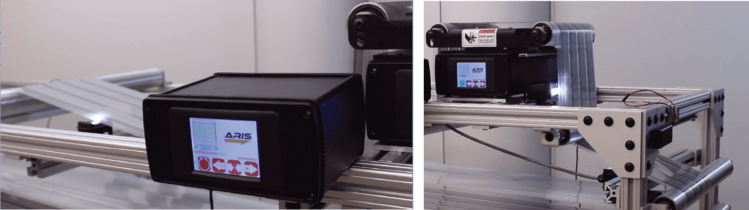Configuration of sensors used to measure the disturbance entering the web guide and leaving the web guide. The upstream sensor (left) is located at a span before the web guide and the downstream sensor (right) is located one span downstream of the web guide.The data from the two sensors are recorded at 50 Hz and also displayed on the LCD screen (left).